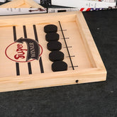 Interactive Puck Slinging Game